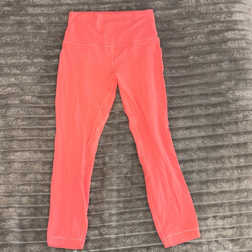 Pink Lululemon leggings.